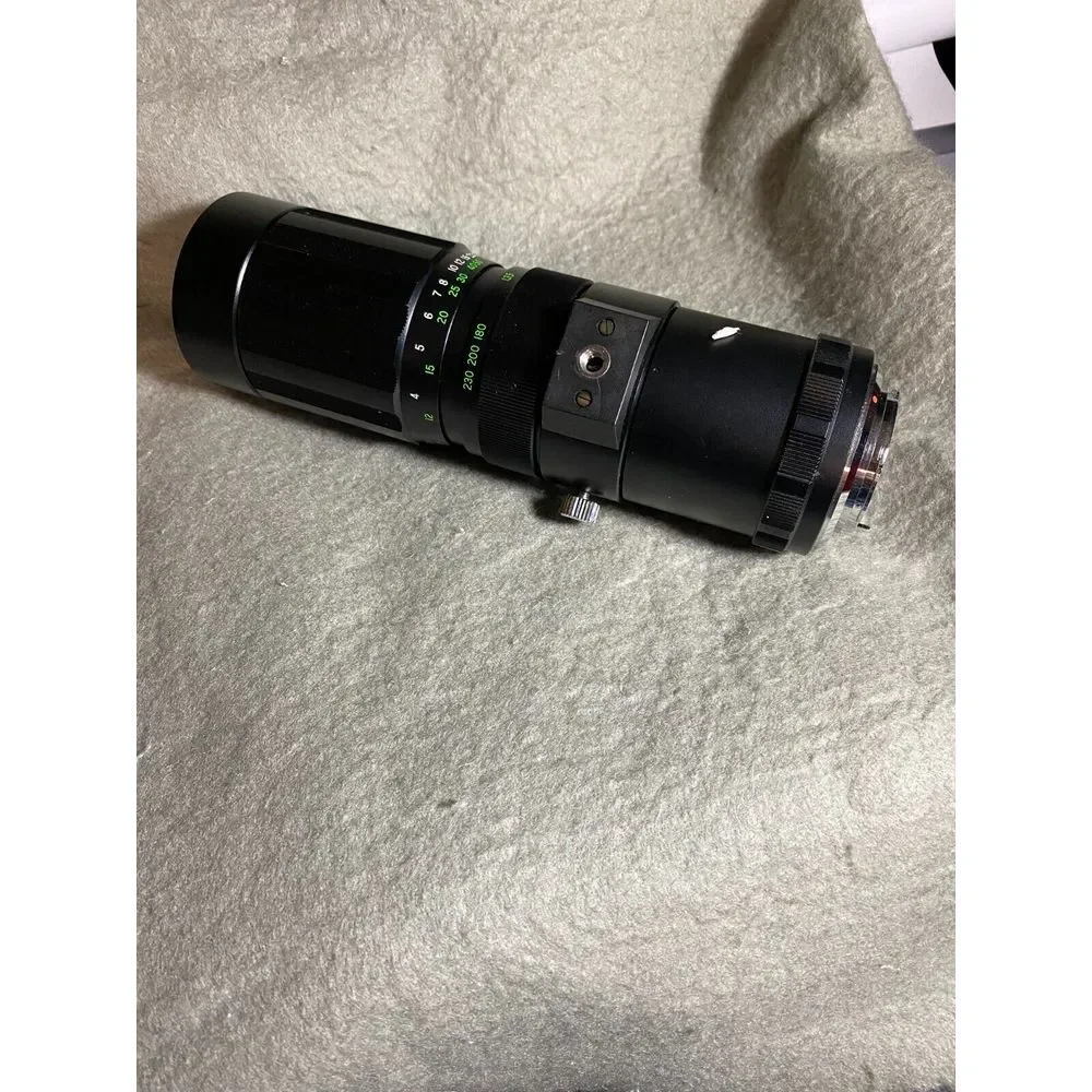 SOLIGOR AUTO-ZOOM LENS I:4.5 F=9OMM -230MM 58‎